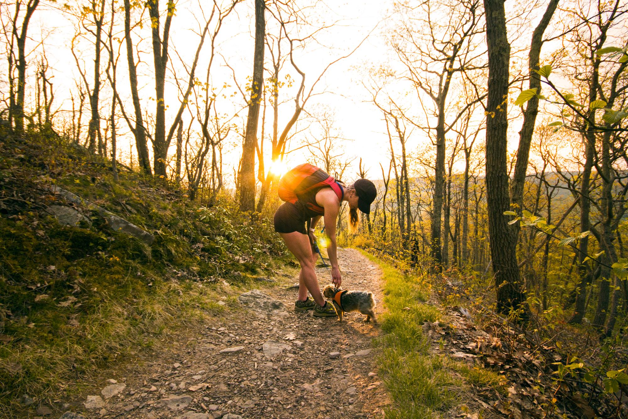 Girl and dog hiking